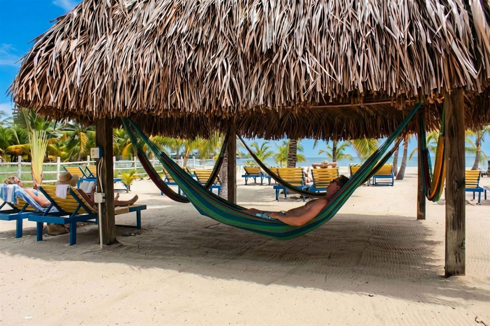 Casa Palma’s beachfront palapa and hammocks